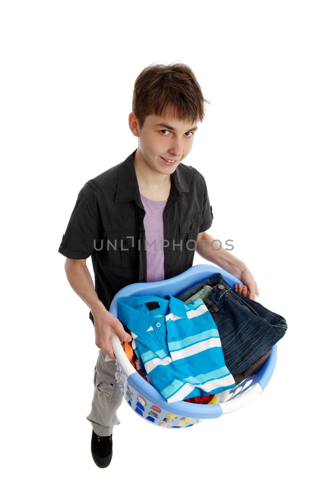 Smiling teenager with a basket of laundry or ironing.  White background.