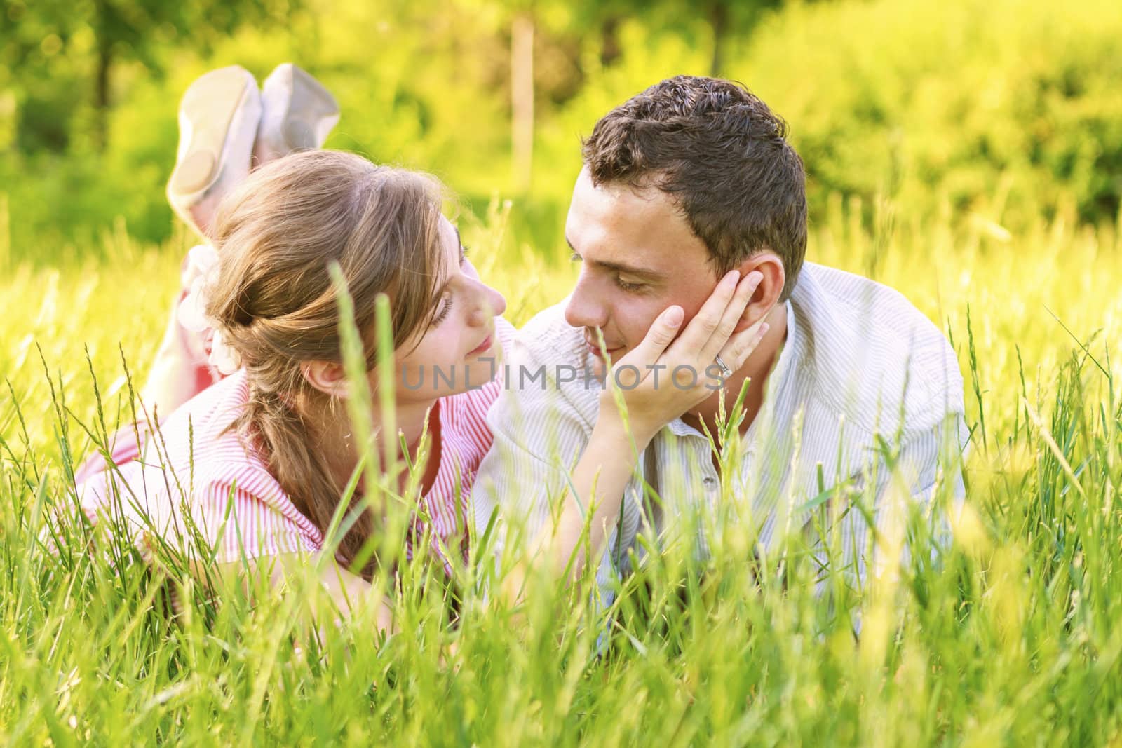 Close-up of a young couple in love by manaemedia