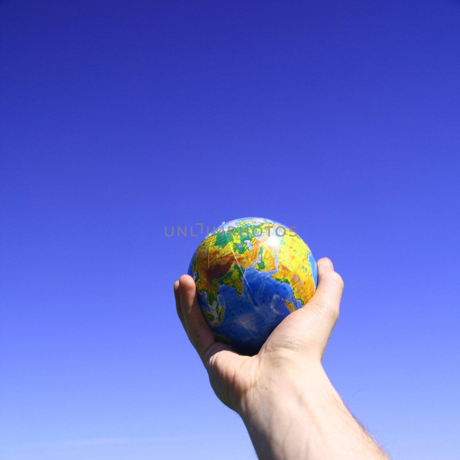 globe of planet earth in man hand