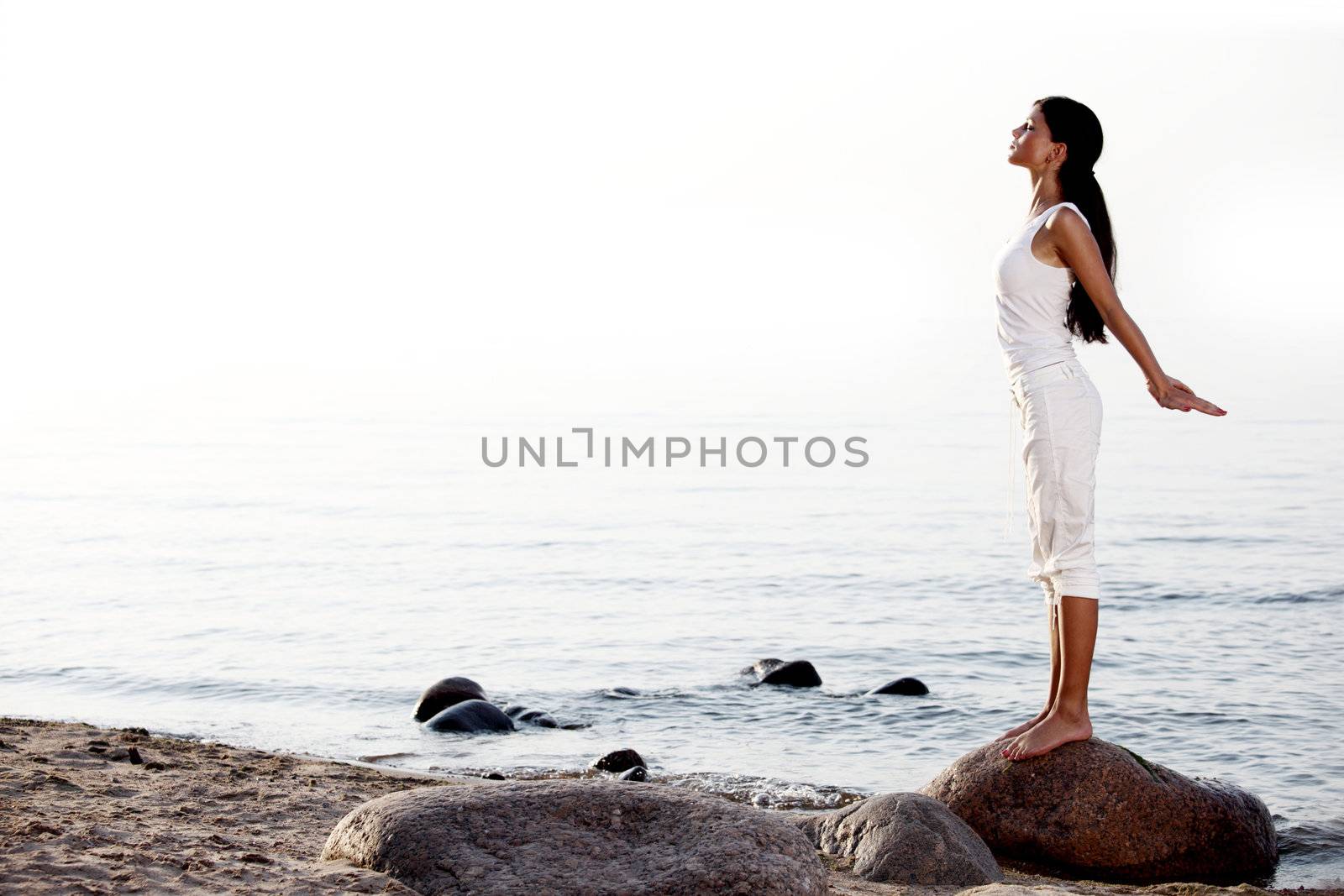 meditation on sand beach by Yellowj