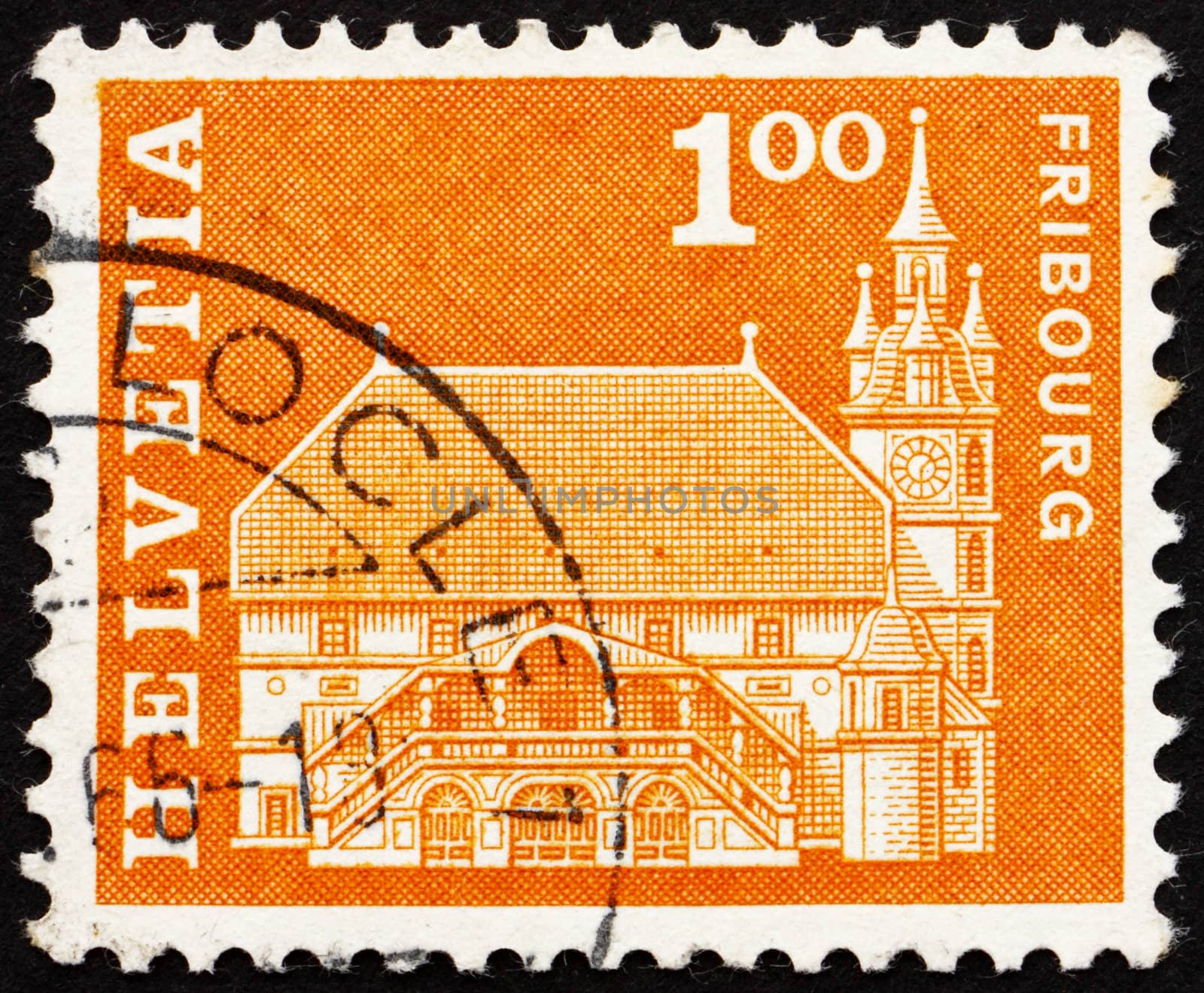 SWITZERLAND - CIRCA 1960: a stamp printed in the Switzerland shows Town hall, Fribourg, Switzerland, circa 1960