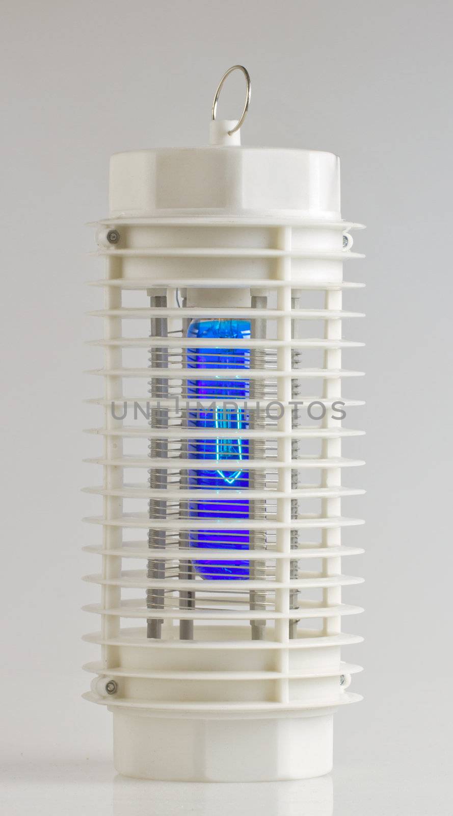 Entire view of a white mosquito lamp with blue light