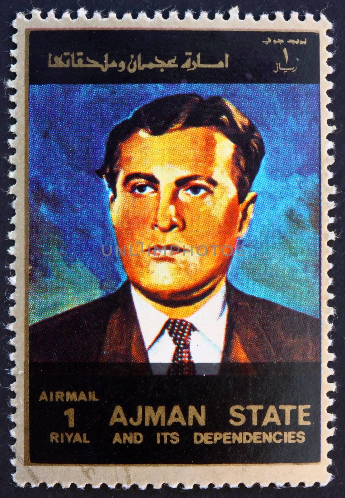 AJMAN - CIRCA 1973: a stamp printed in the Ajman shows Wernher von Braun, Rocket Scientist, Aerospace Engineer and Space Architect, circa 1973