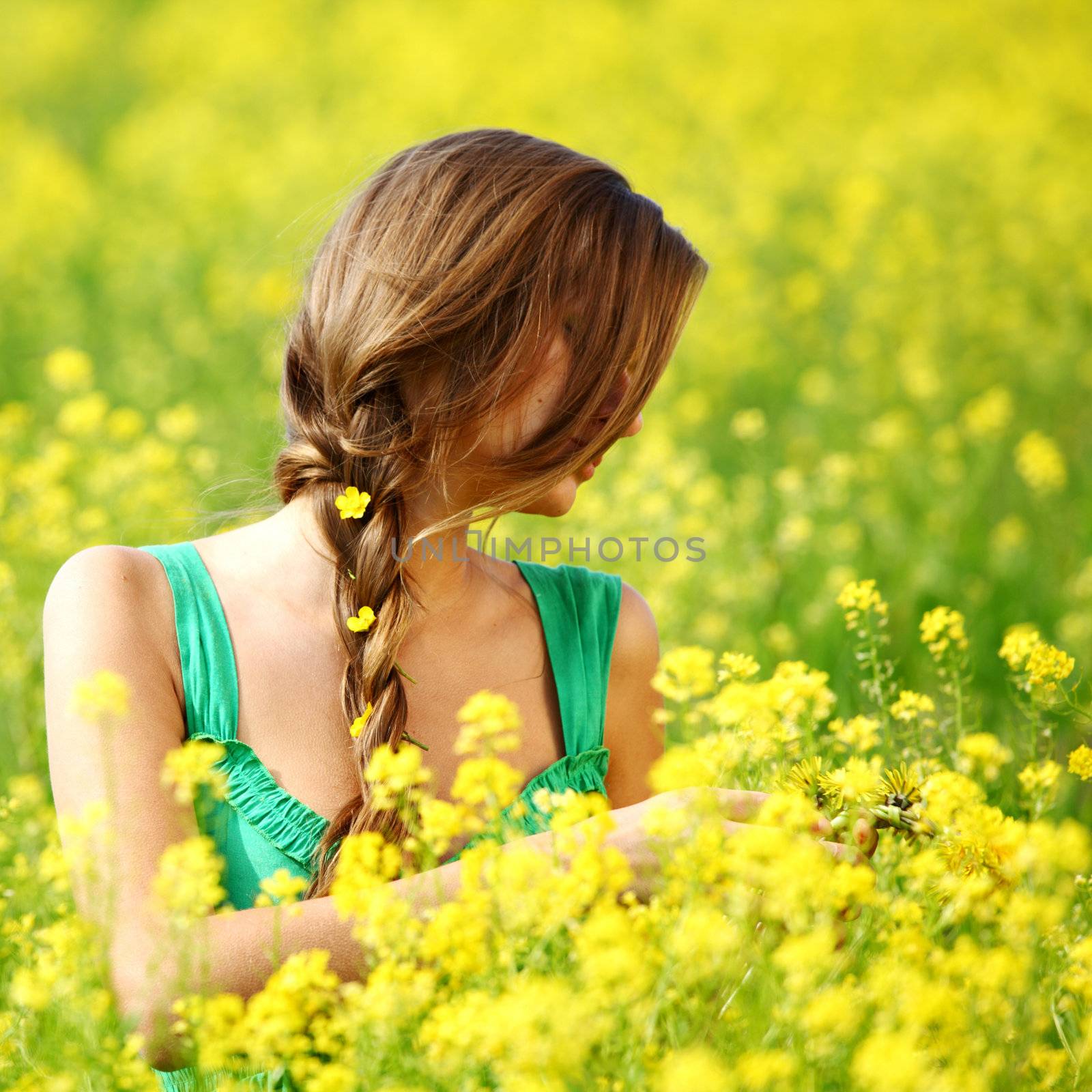 woman on oilseed field by Yellowj