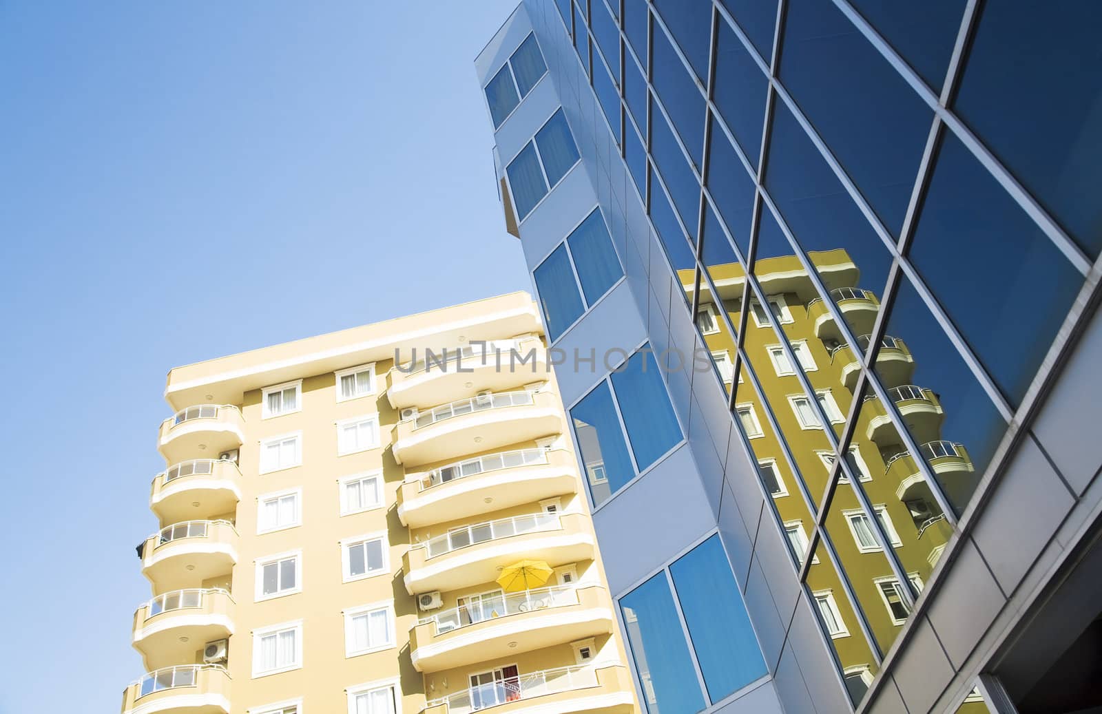 windows and balconies of modern residential buildings