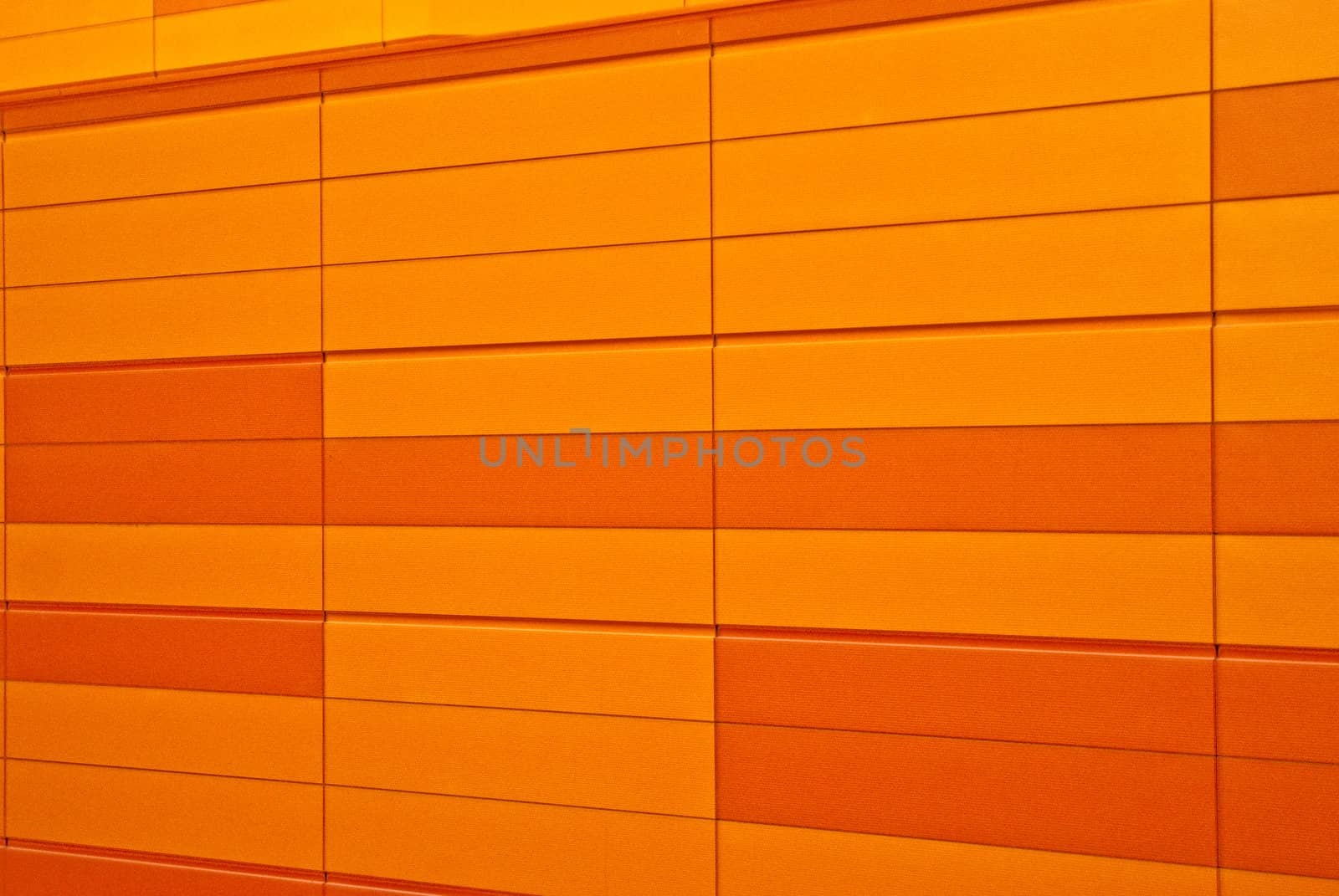 Vivid orange pattern block wall