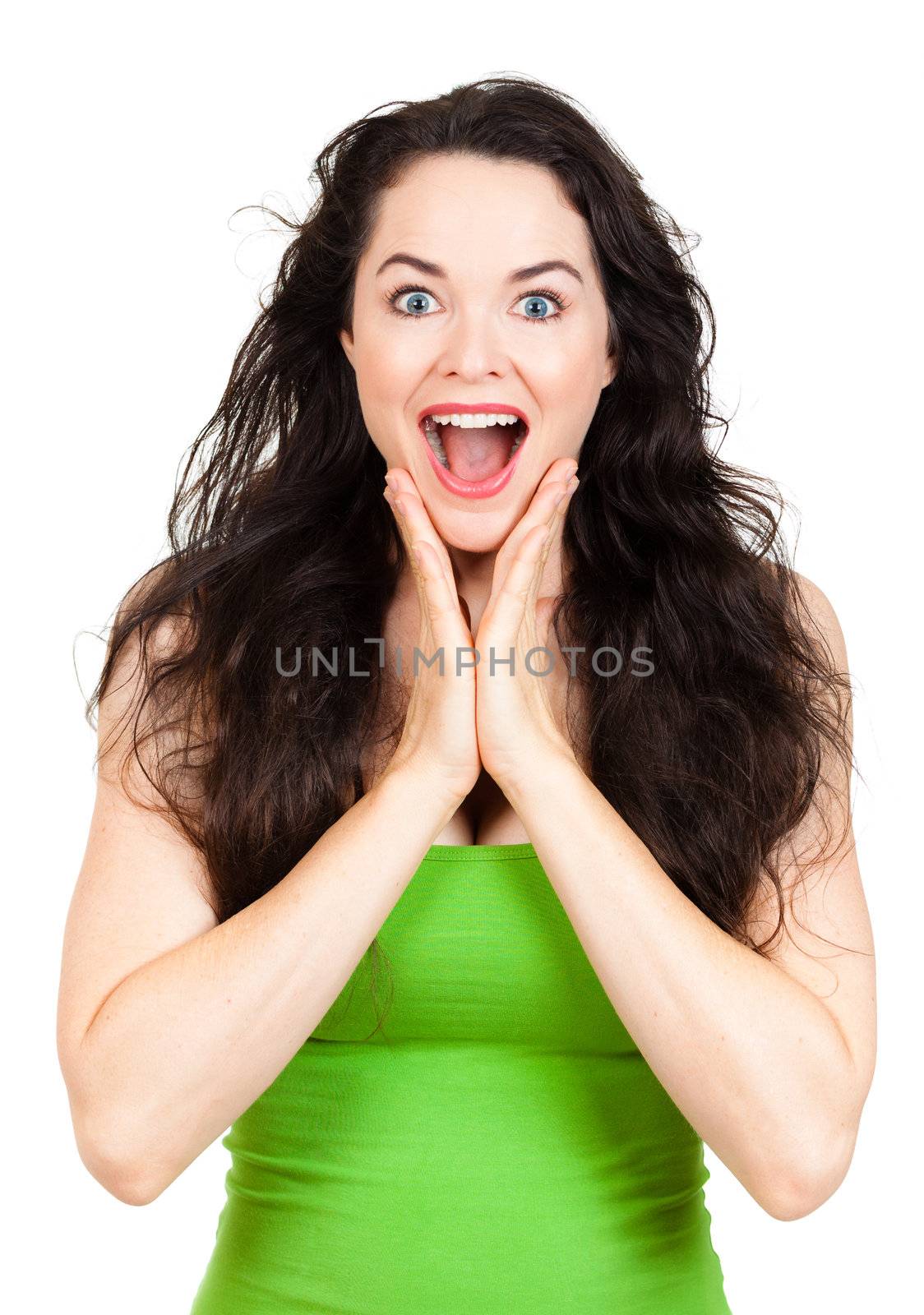 A happy and  surprised beautiful woman looking at camera. Isolated on white.