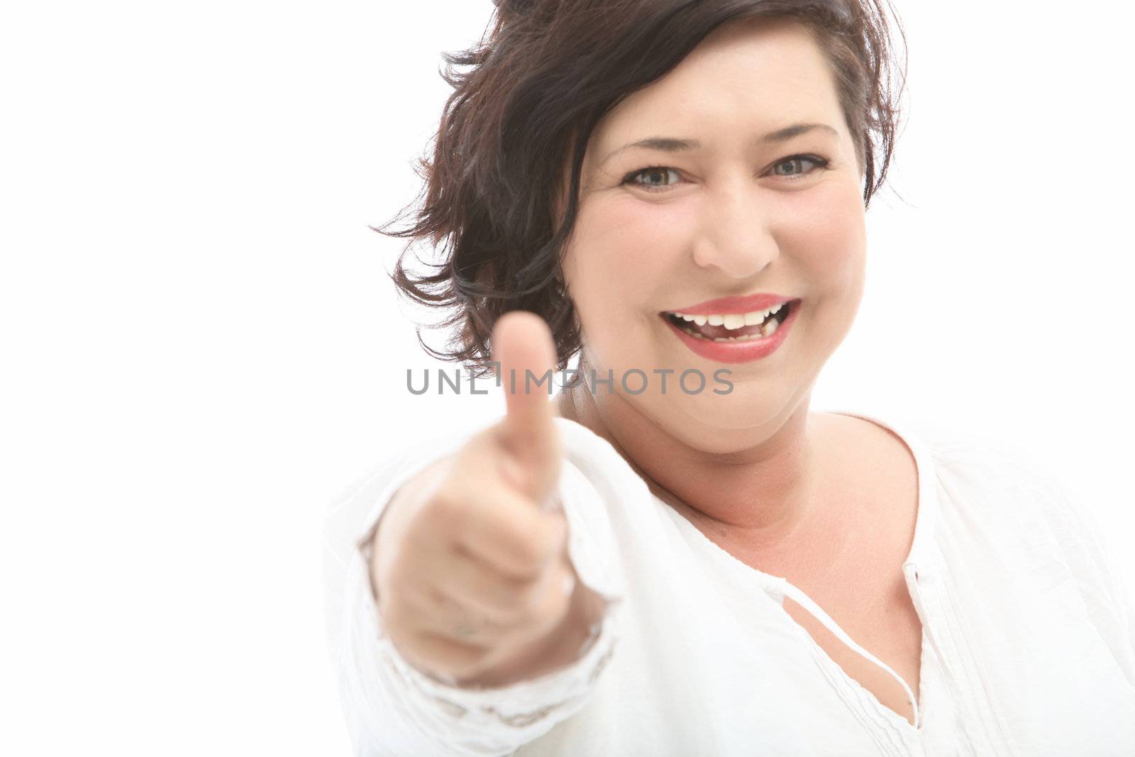 Middle-aged woman shows the cheerful thumbs up - cutout on white