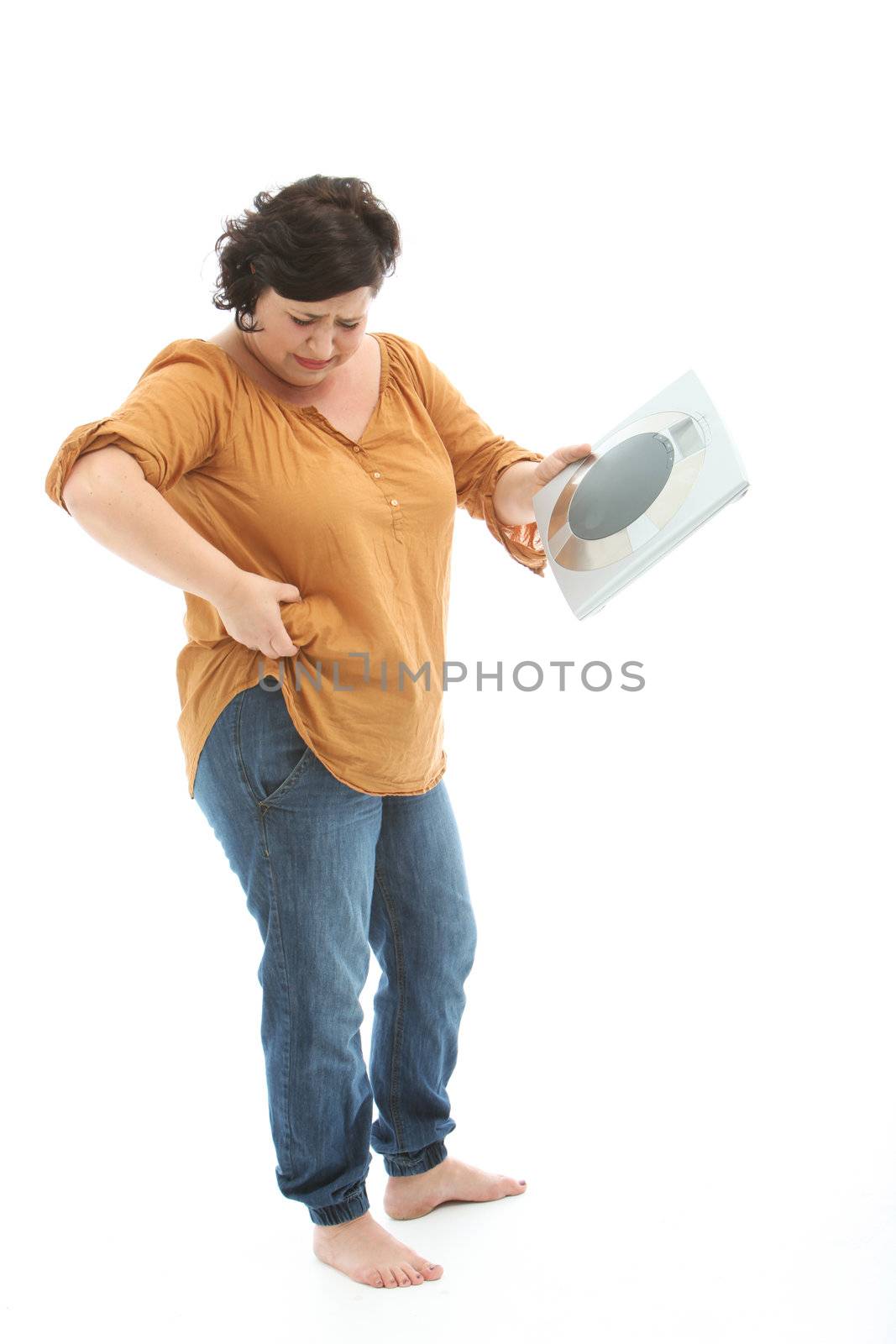 Again a few kilograms more - with unhappy woman scale -cutout on white