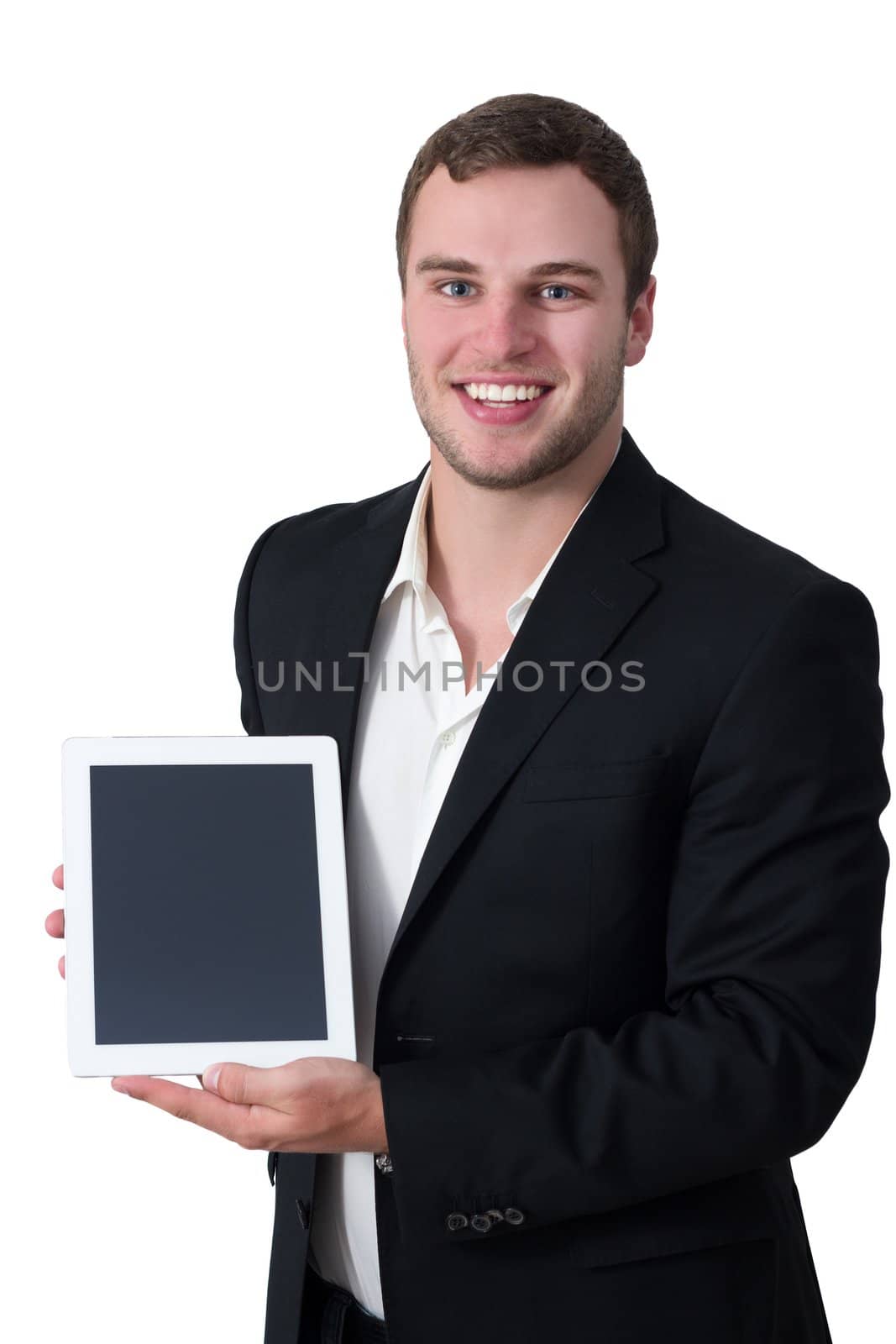 Young white man in suit holding white tablet pc and smiling