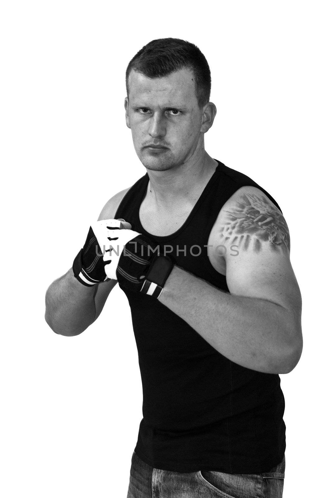 Young Boxer looking into Camera and ready for a fight