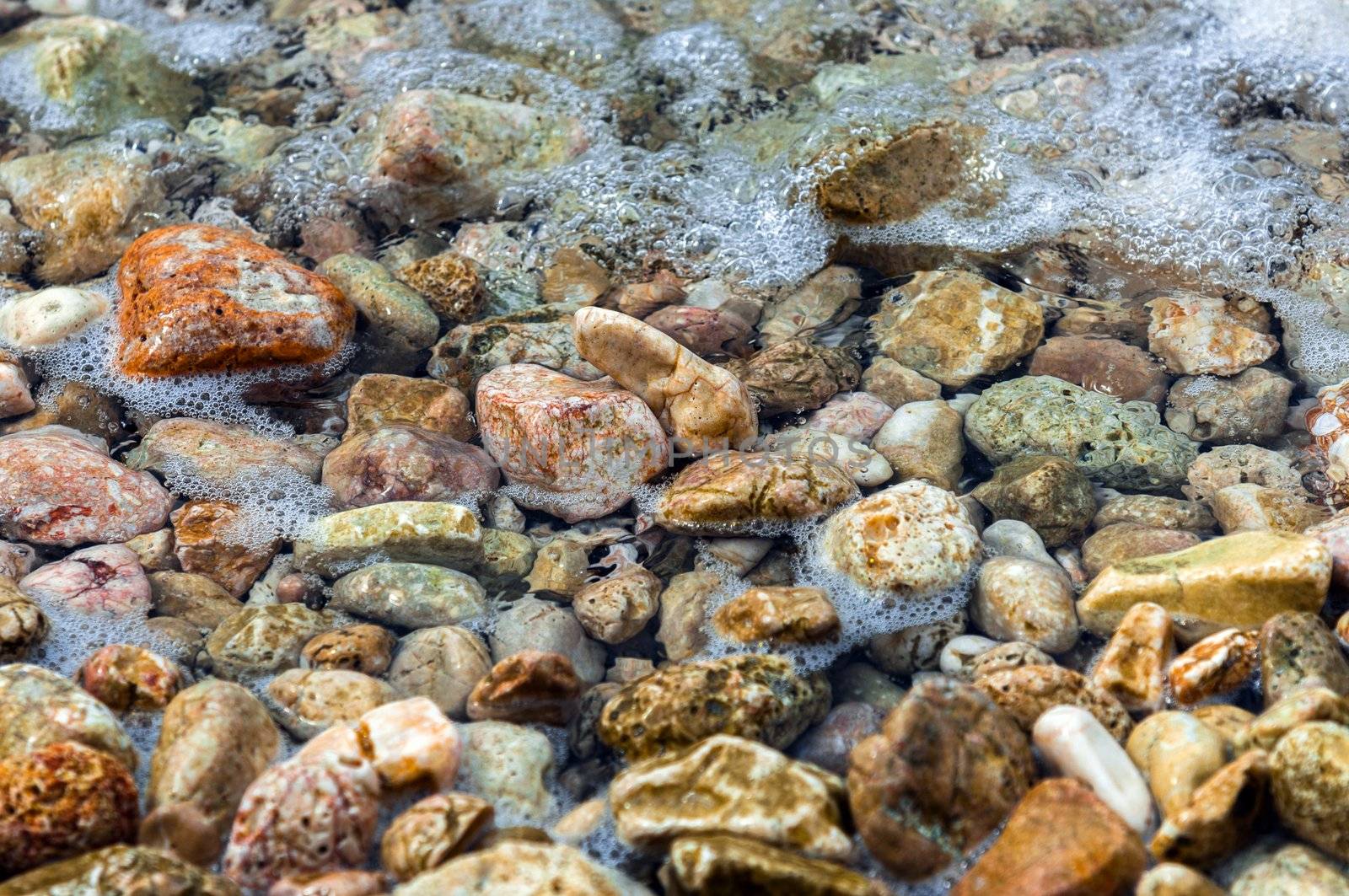 Beautiful Pebble stones at the sea