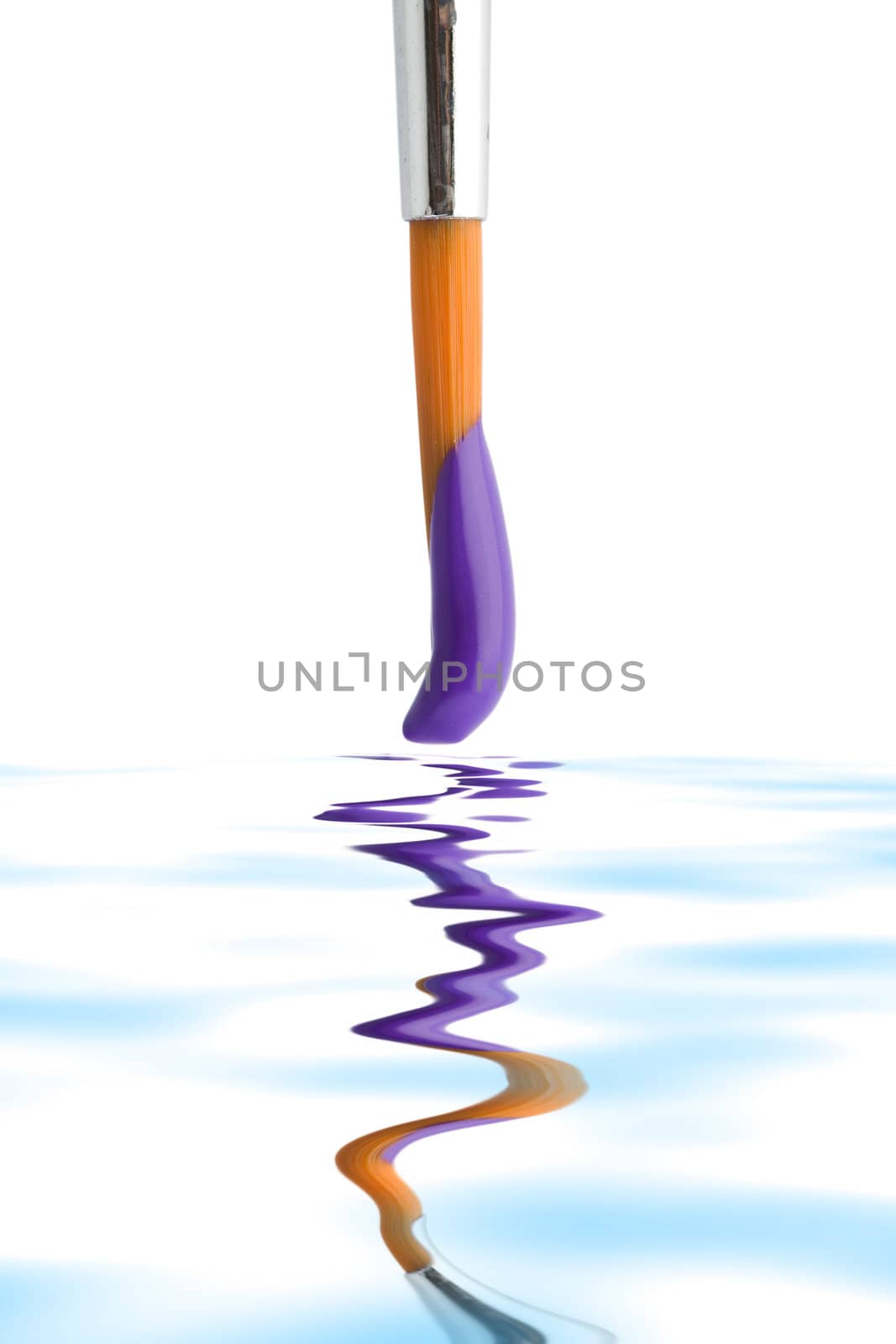 Stock photo: an image of a brush with violet paint on it