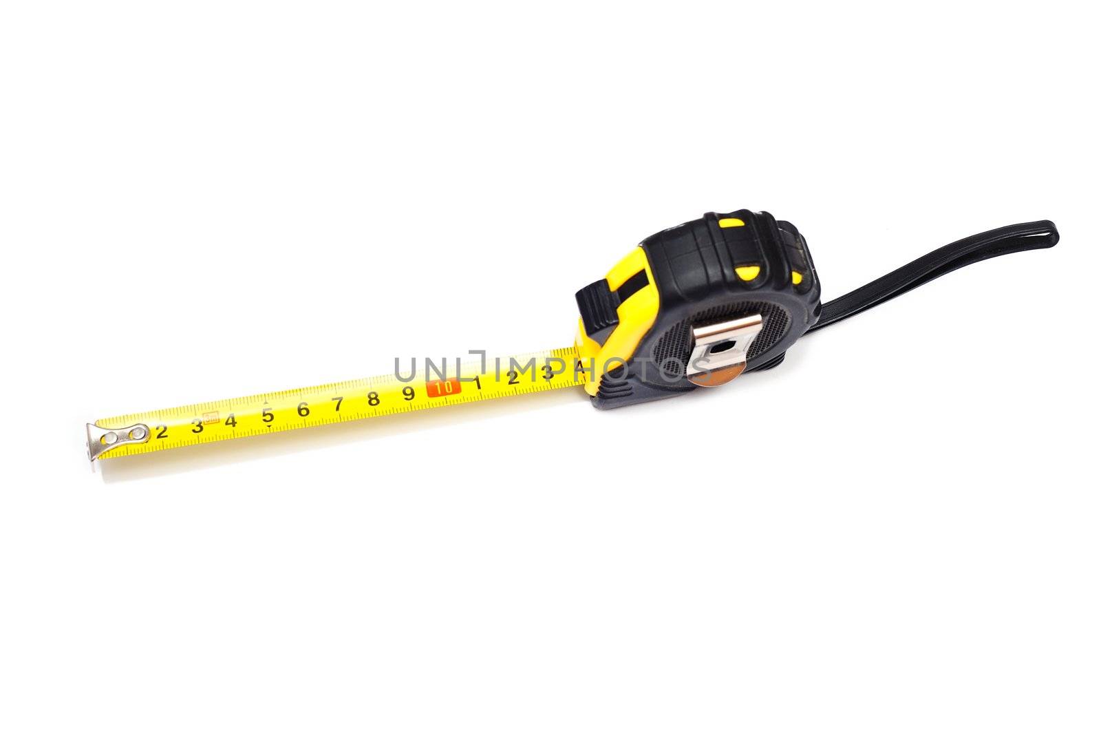 Extended retractable tape measurer on a white background 