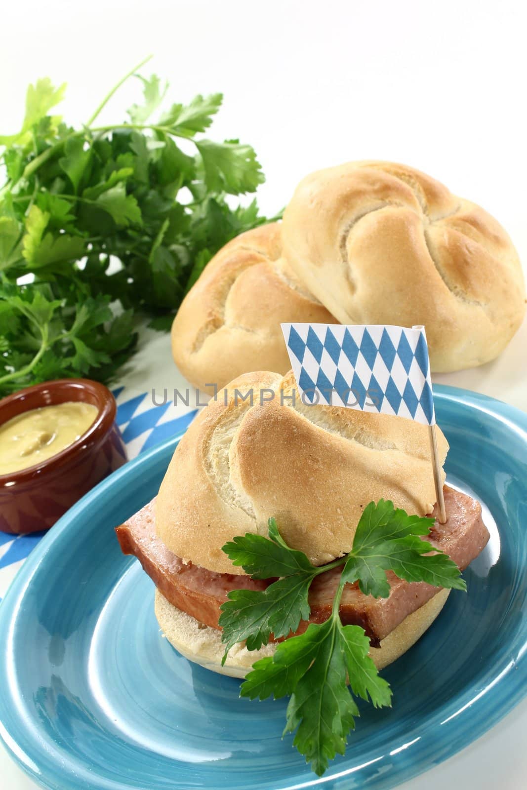 a bread roll with beef and pork loaf and parsley