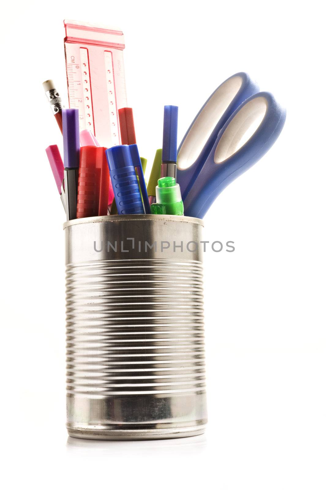 Tin can with stationery on white background