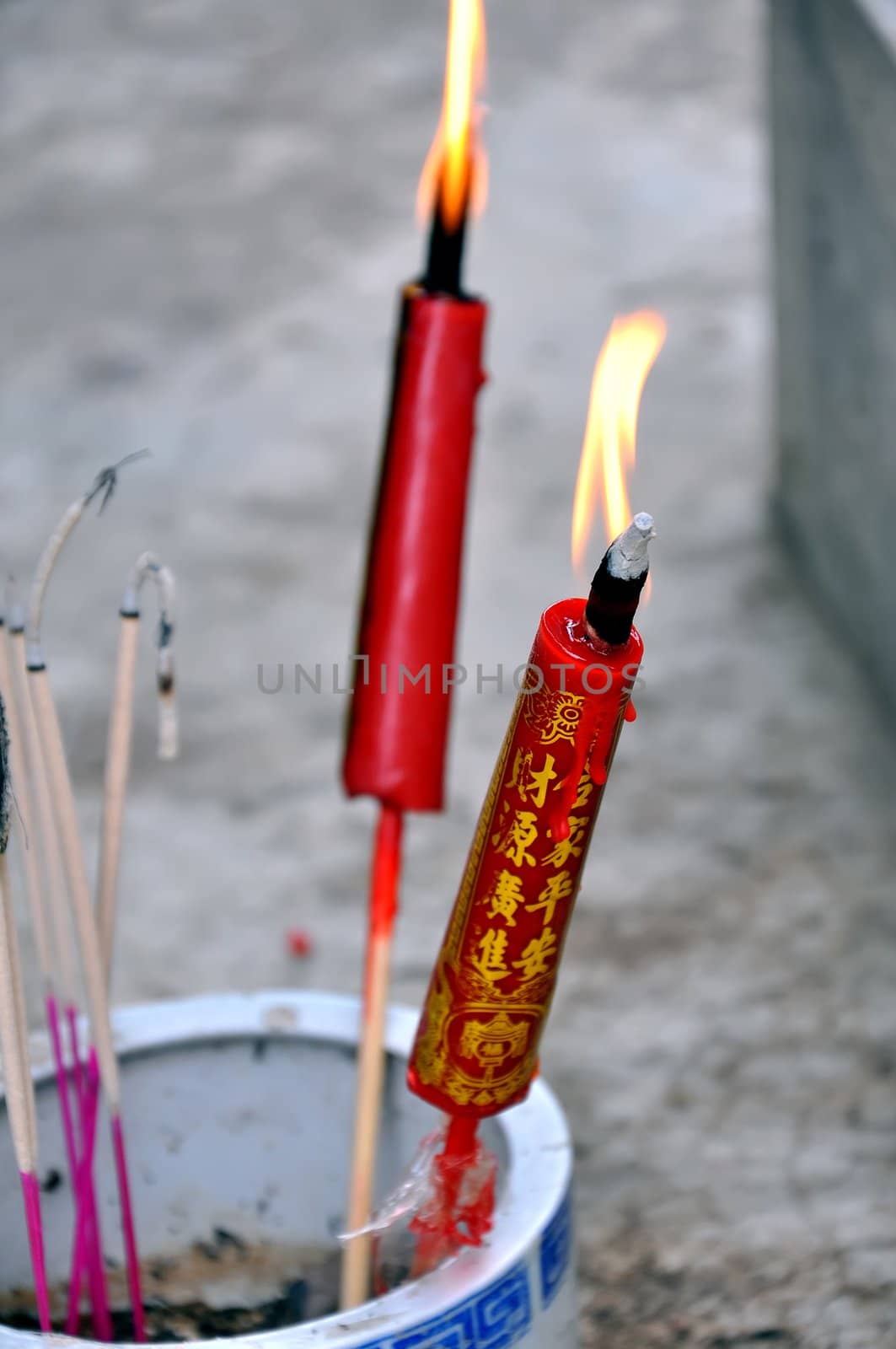 Lighting candles for the temple