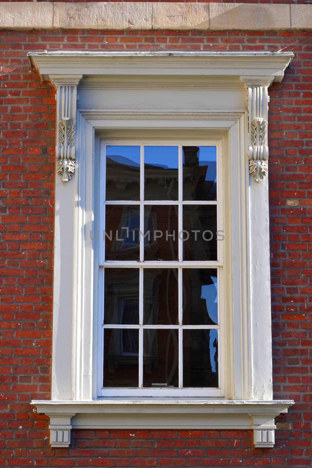 victorian window with architectural detail by njene