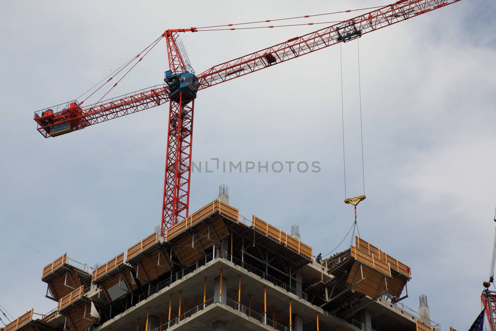 crane on top of skyscraper