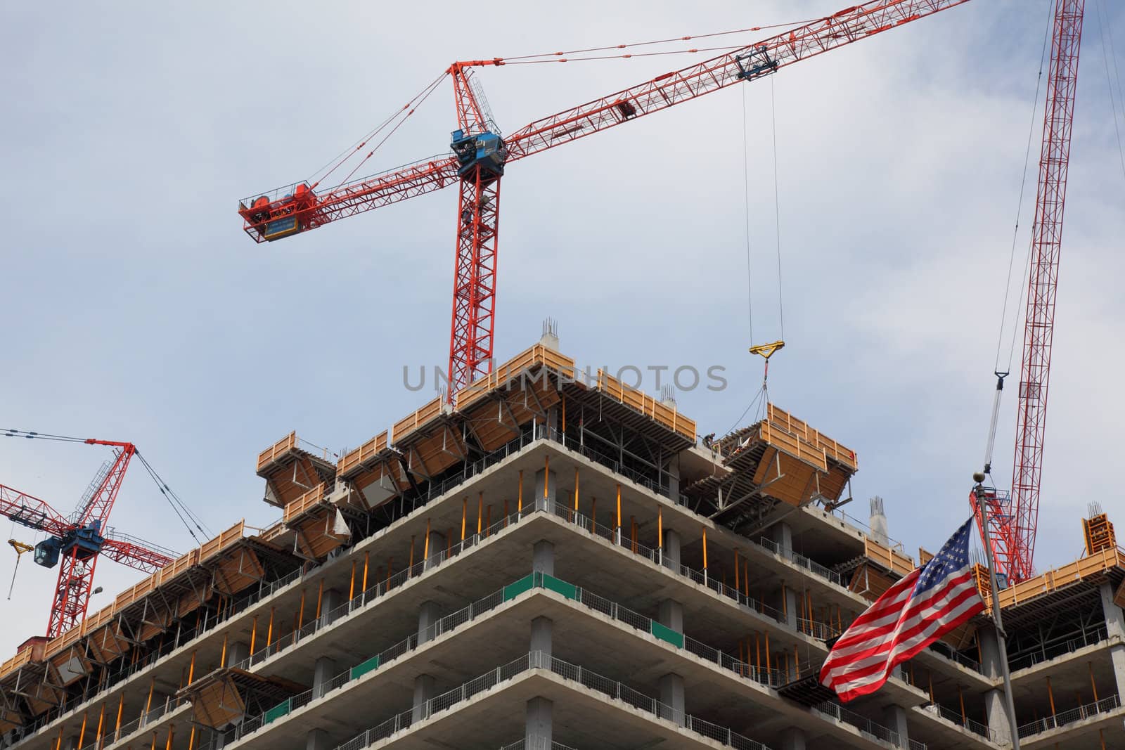 crane on top of skyscraper building a office highrise tower