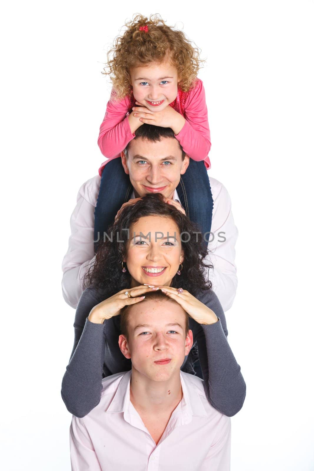 Portrait of happy Caucasian family smiling together on white background