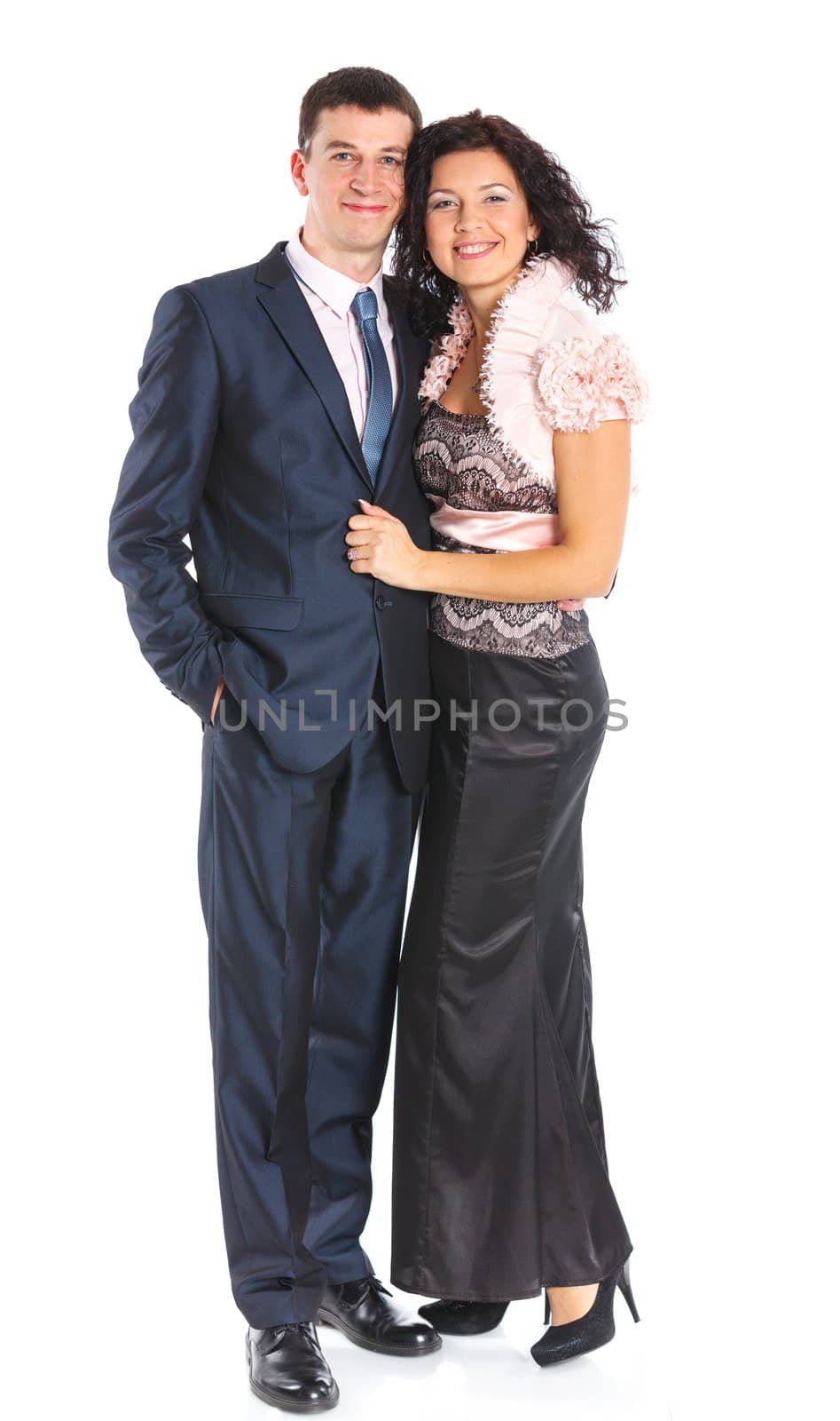 Sweet happy young couple smiling together. Isolated on white background