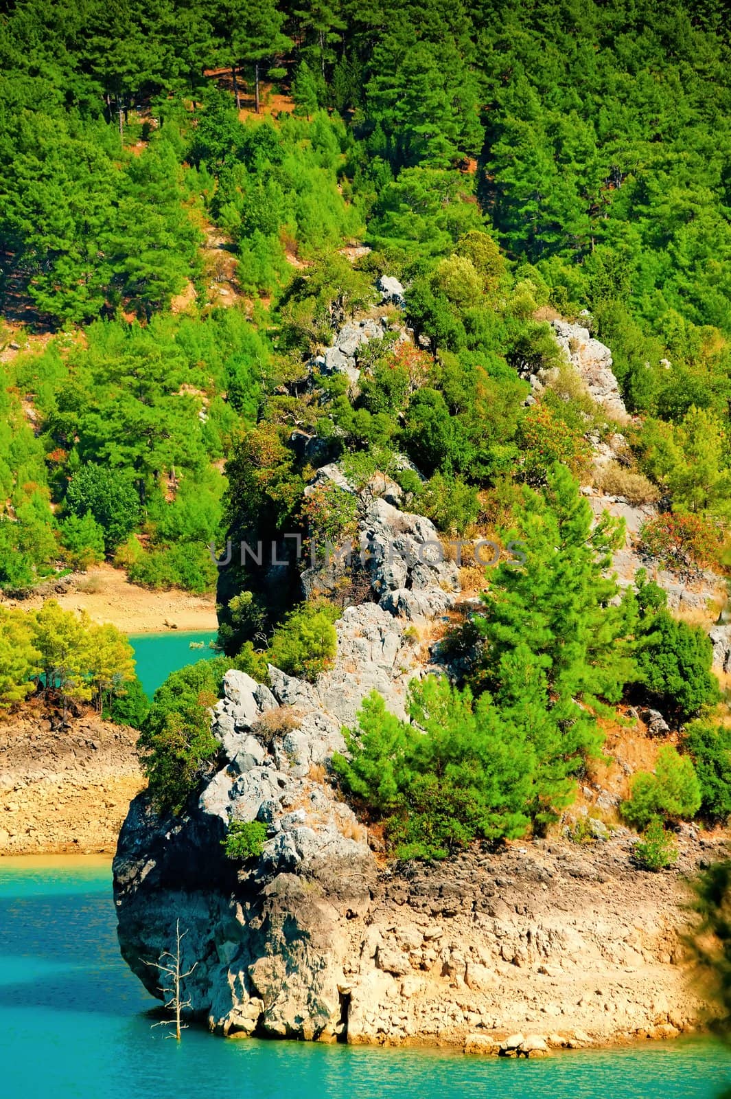 Rocky island in a mountain lake