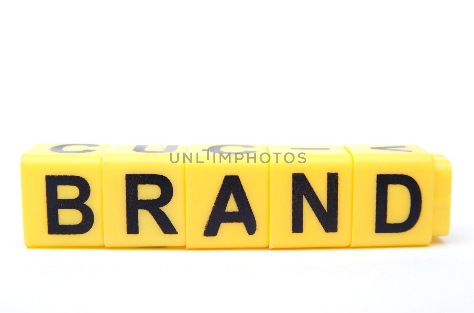 An image of yellow blocks with word ''brand'' on them