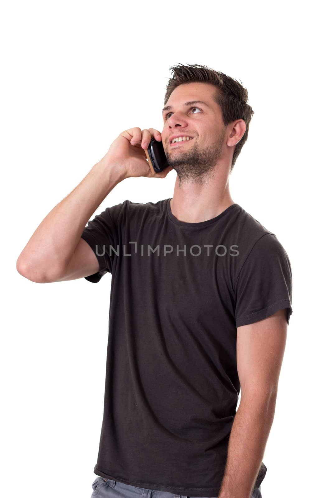 Young Man talking on the phone and smiling