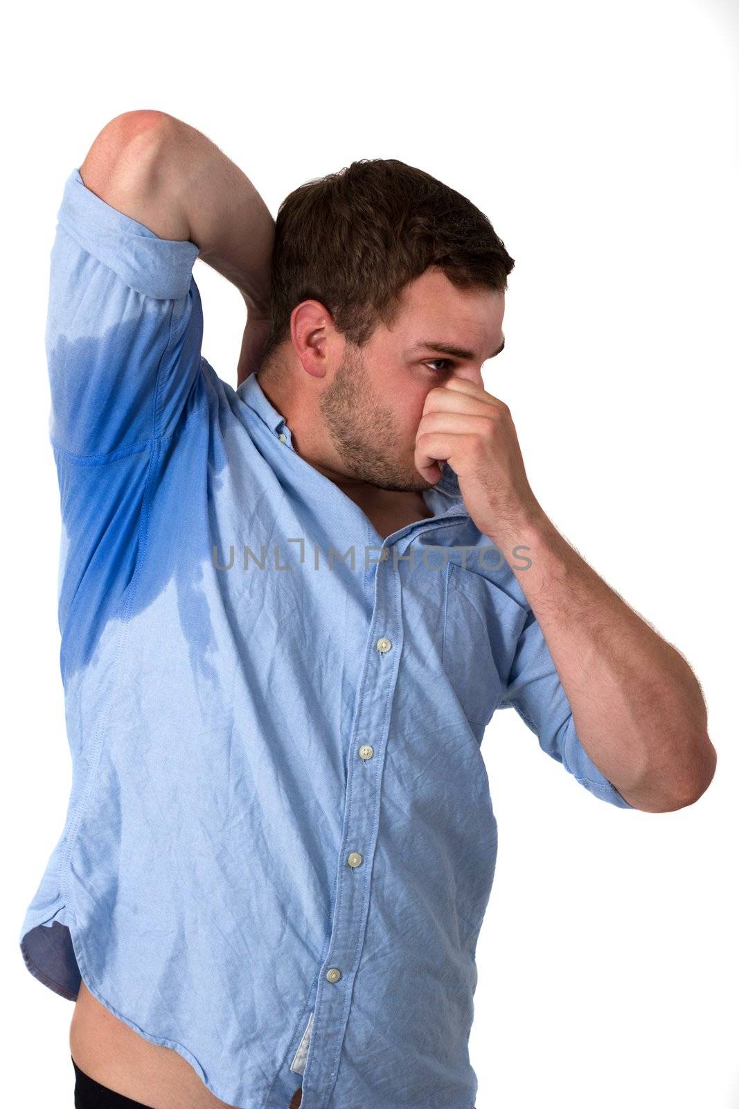 Man sweating very badly under armpit by dwaschnig_photo