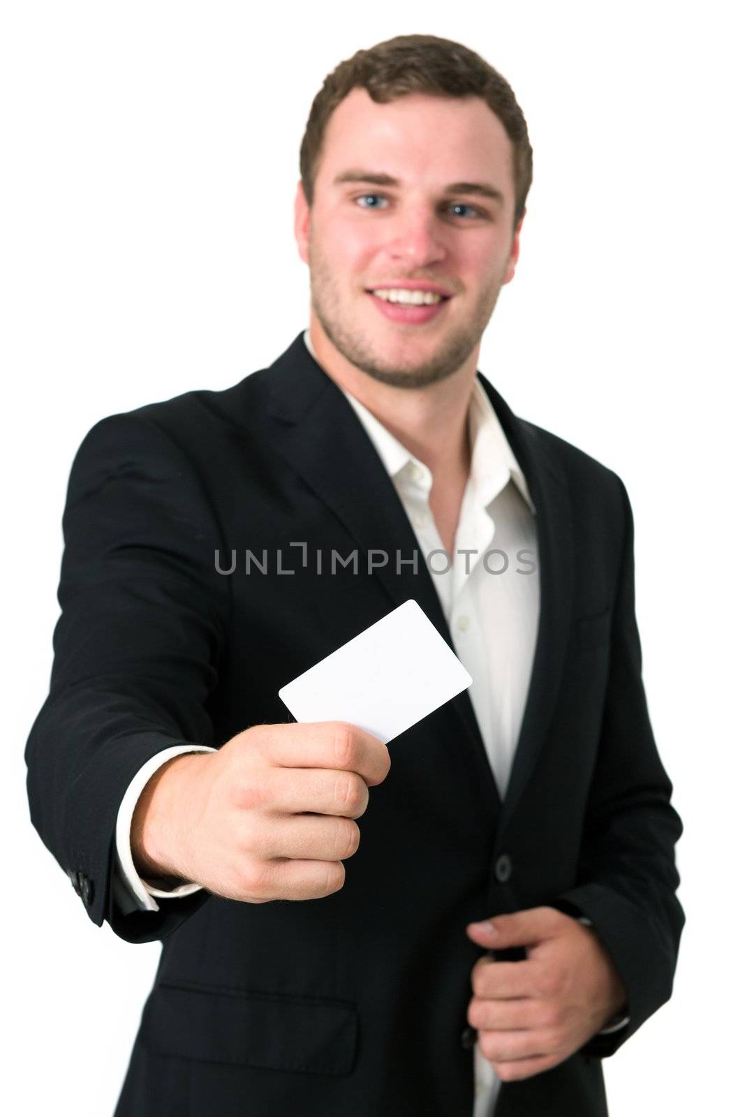 Businessman in a suit giving he's blank business card