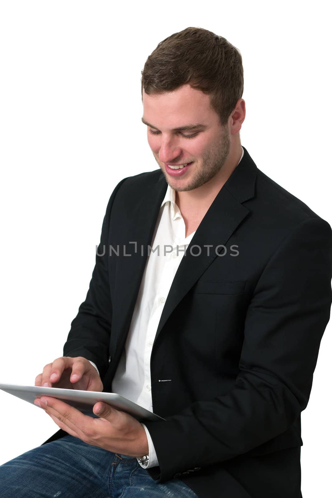 Young Businessman working on a tablet pc by dwaschnig_photo
