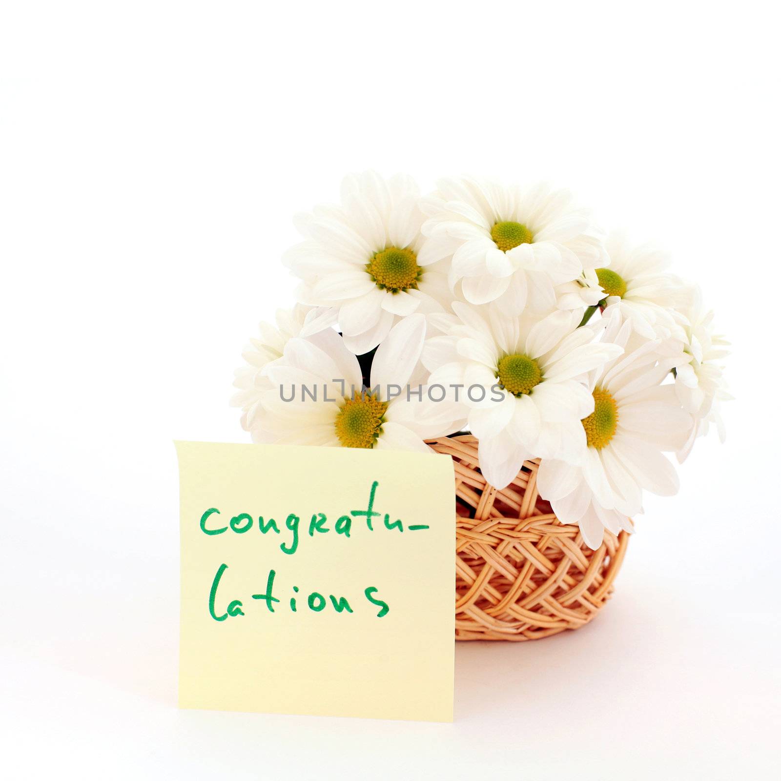 An image of basket with white daisies with inscription (congratulations)