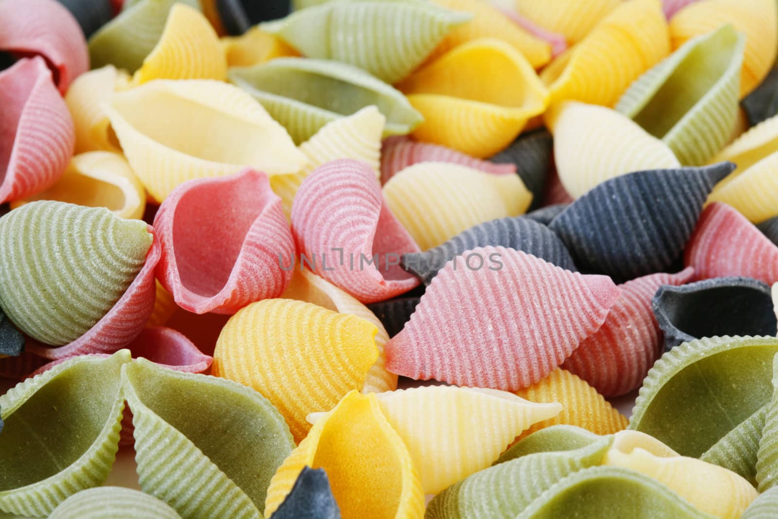 A background of variable colorfull pasta shells