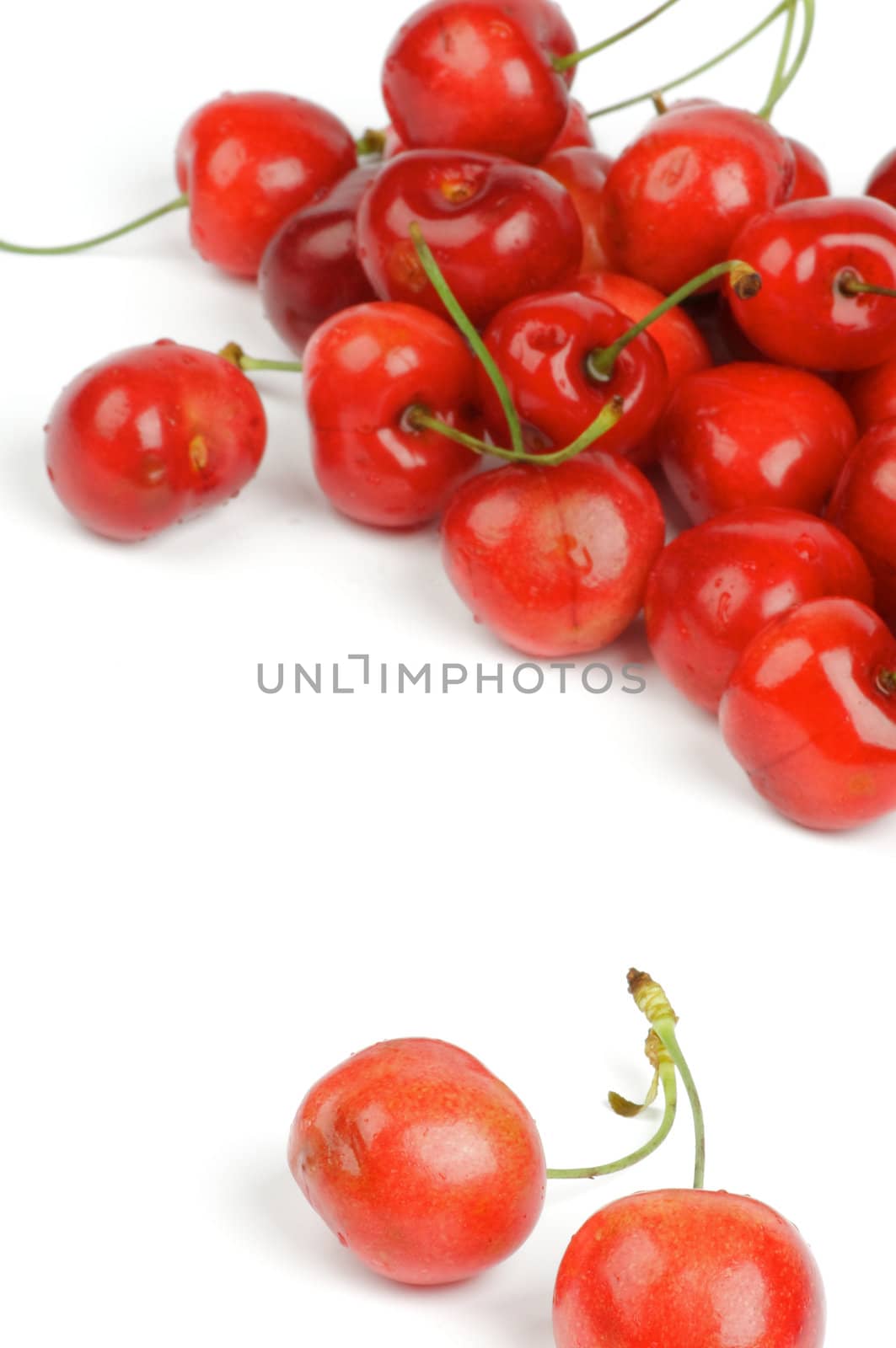 Arrangement of Fresh Ripe Cherry isolated on white background