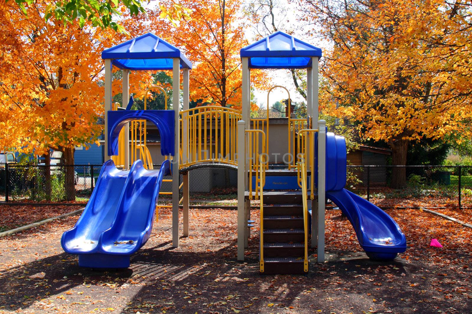 childrens school playground with slide and climbing bars