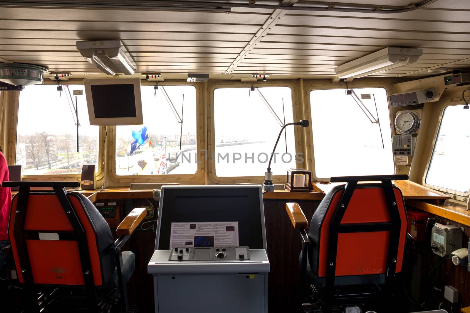 A modern NATO warship command bridge wheelhouse