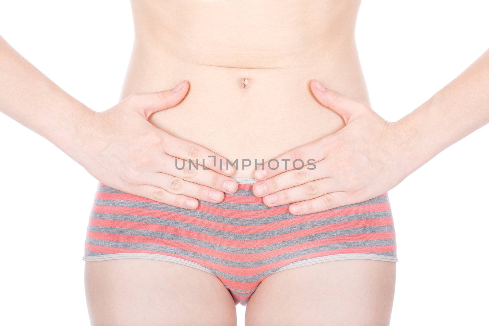 Girl in uderwear having a menstrual pain, isolated on white background