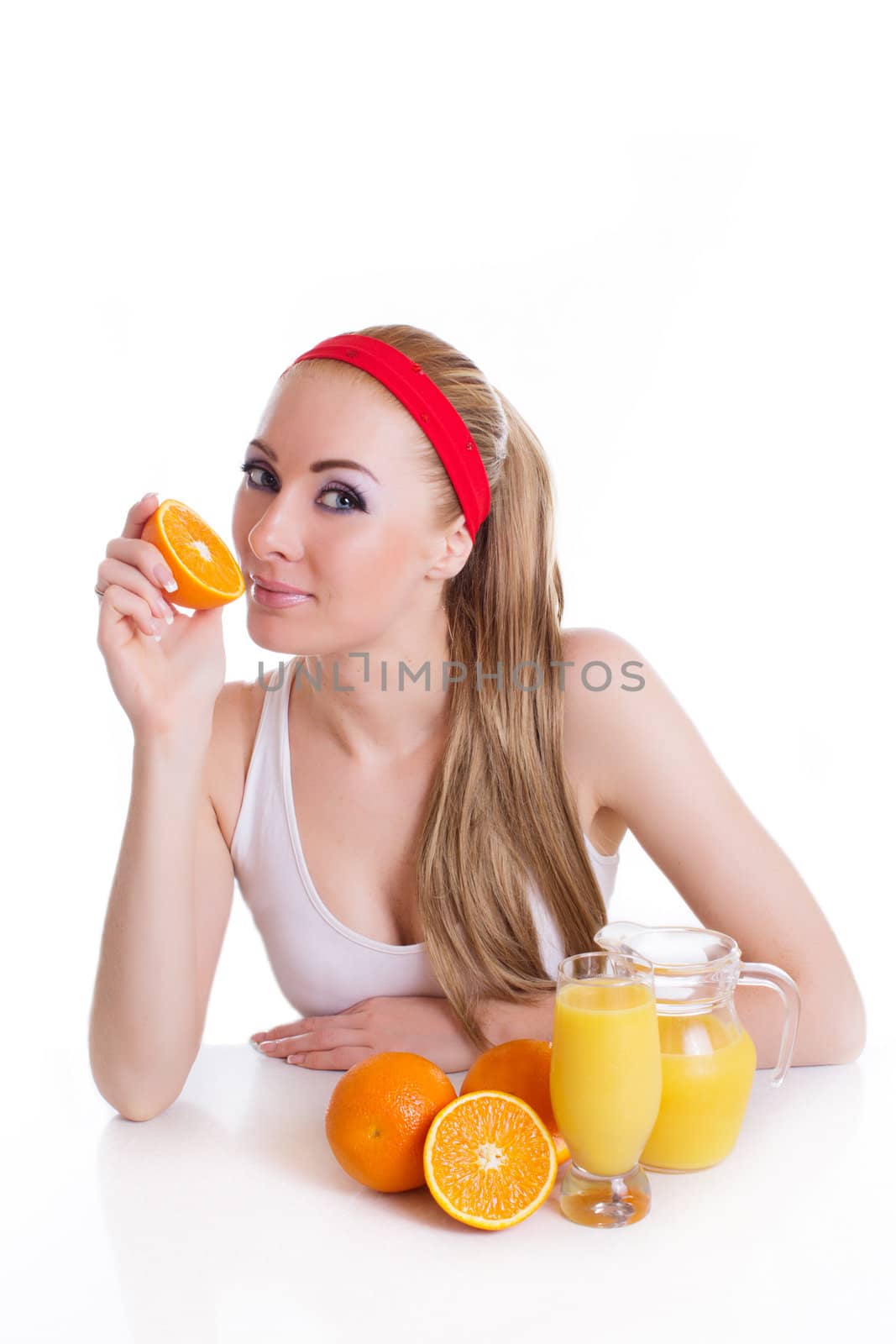 Sporty woman sitting with orange juice by Angel_a