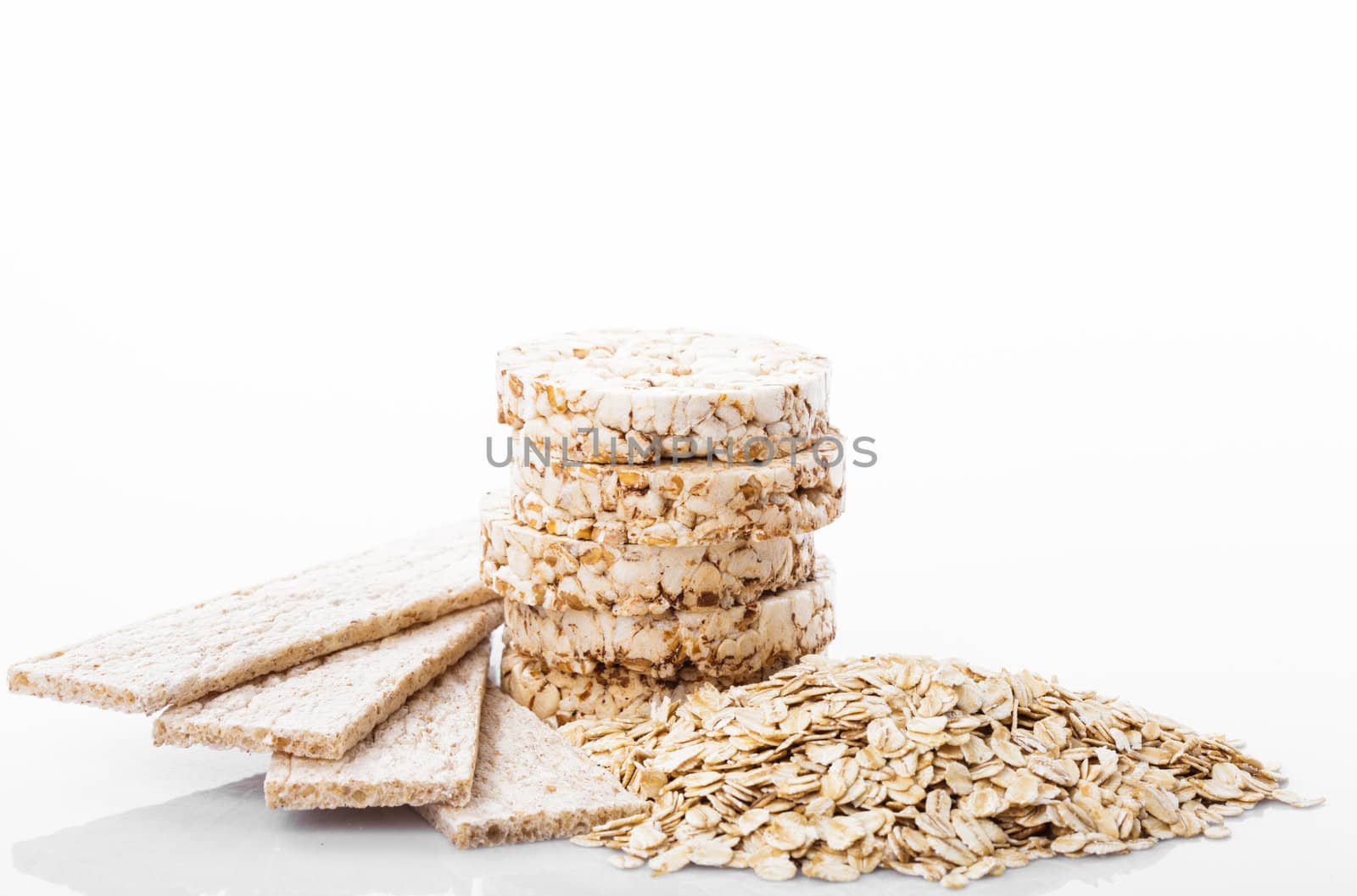 Various dietary oat products on wooden table