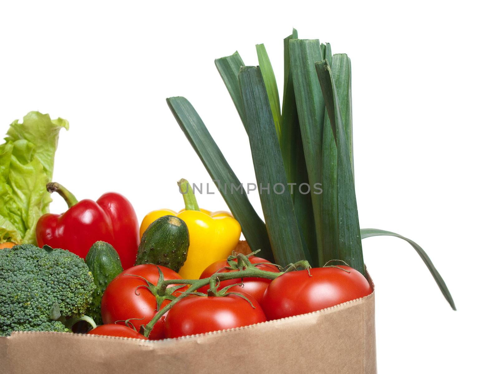 Bag full of vegetables, isolated on white