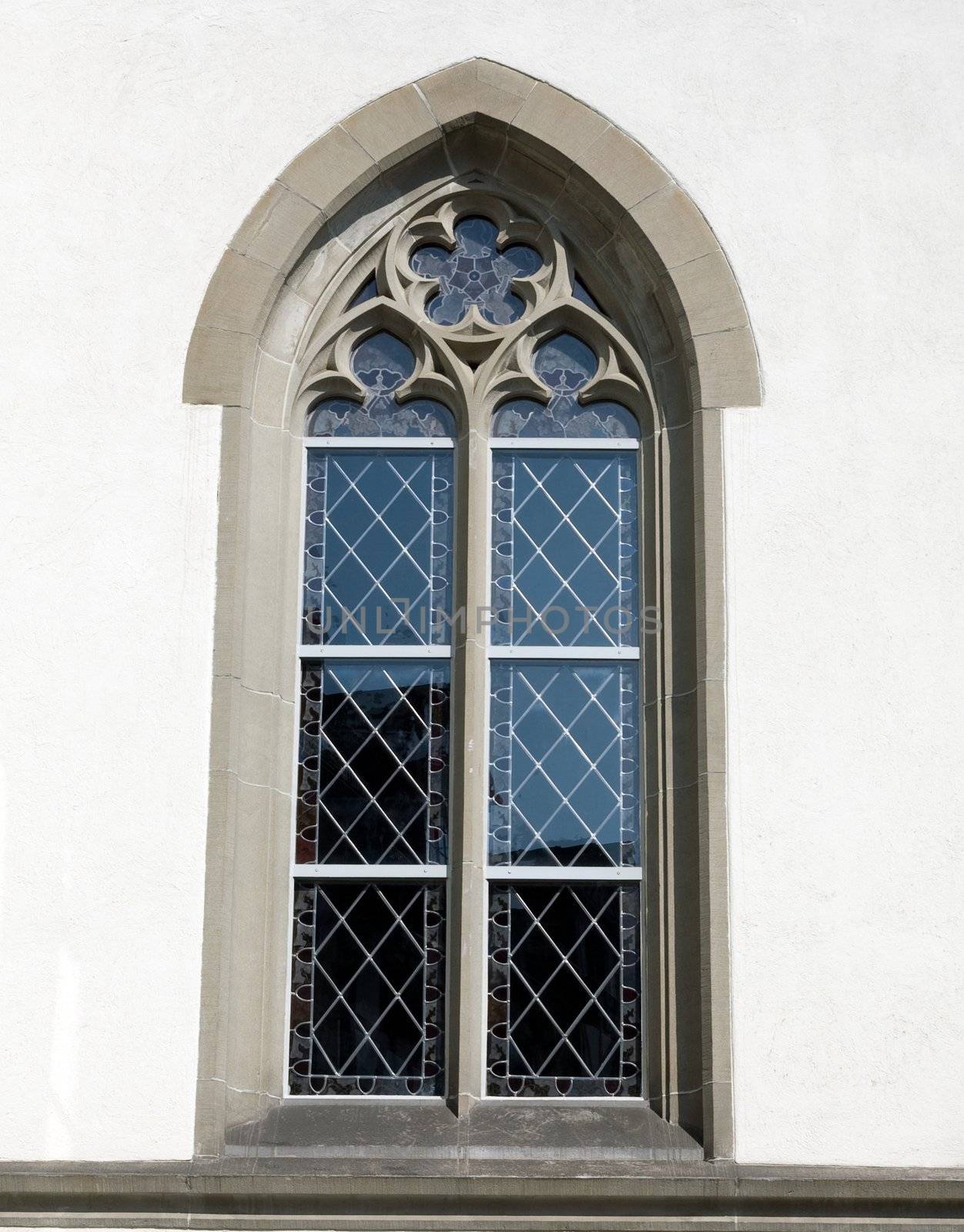 An image of a window in white wall