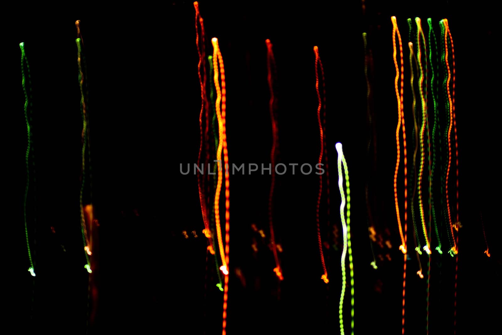 An image of multicoloured festive lights on black sky