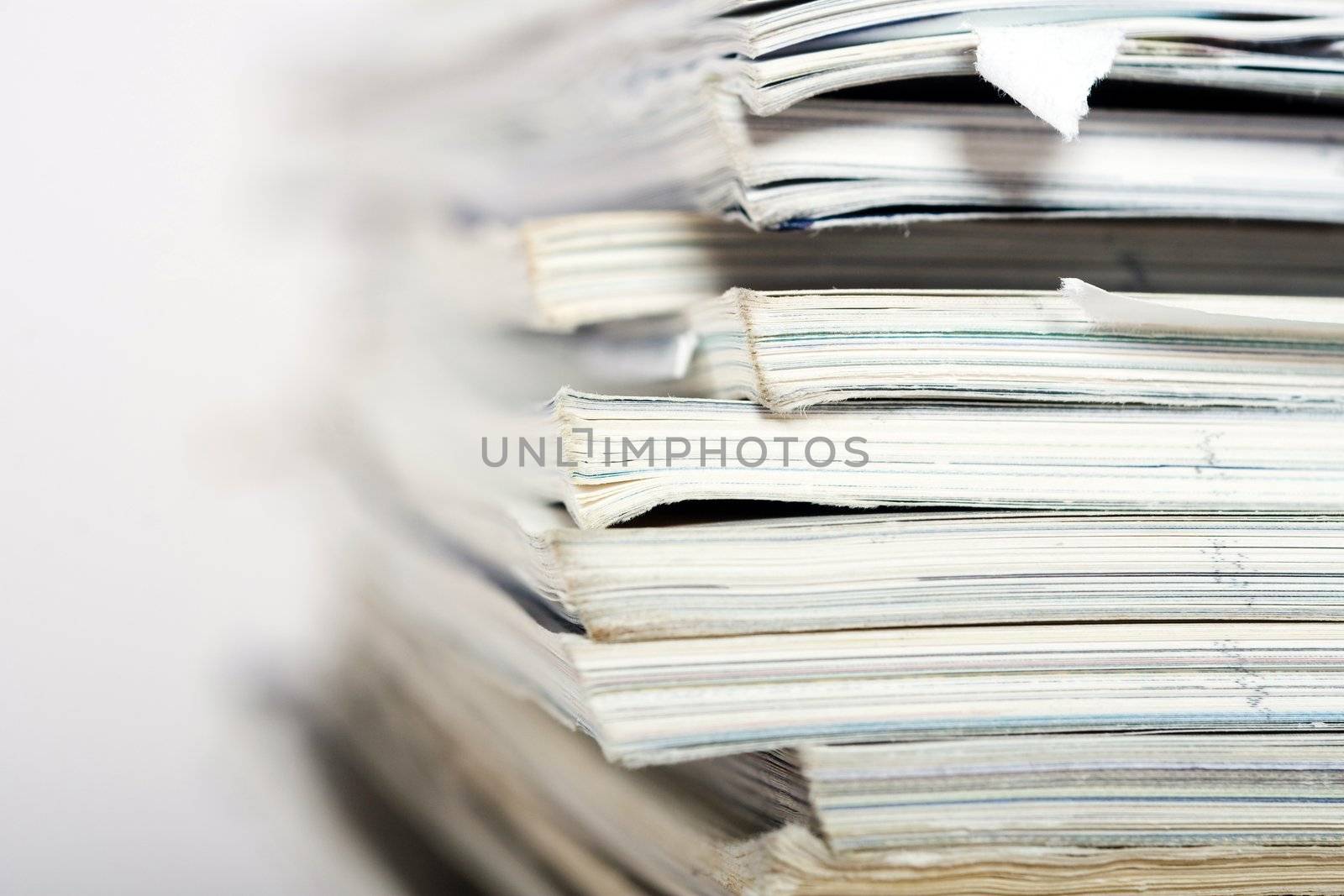 Stack of paper on neutral background closeup