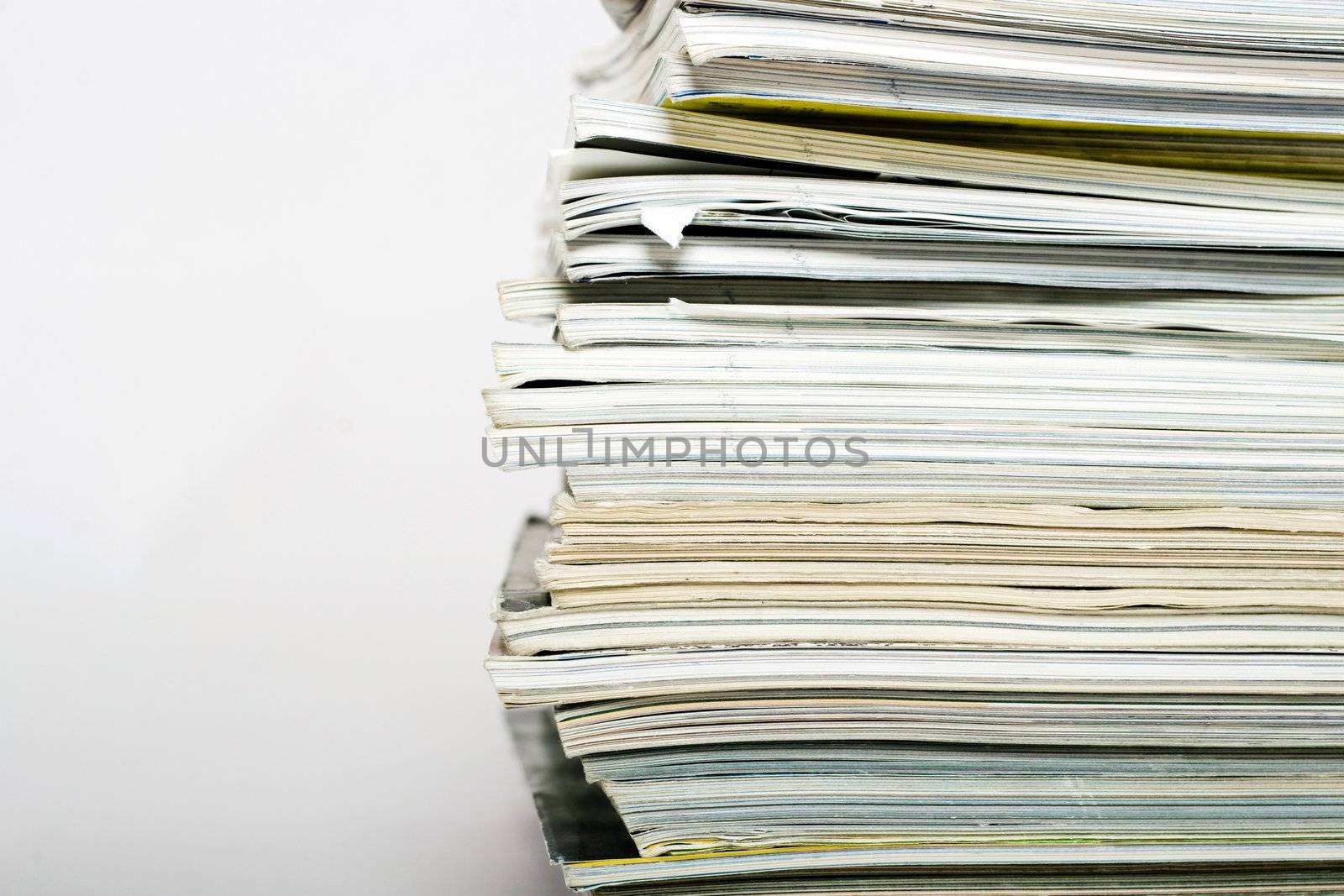 Stack of magazines by velkol