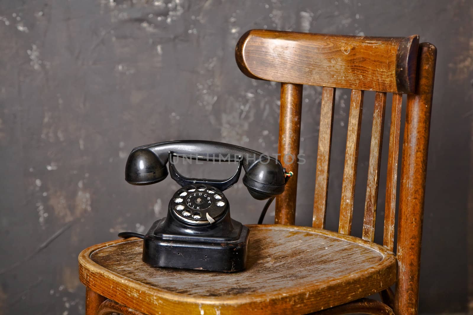 An image of old black telephone. Photographed in the studio.