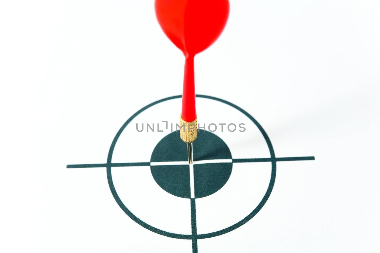 An image of dart and black target. Close up