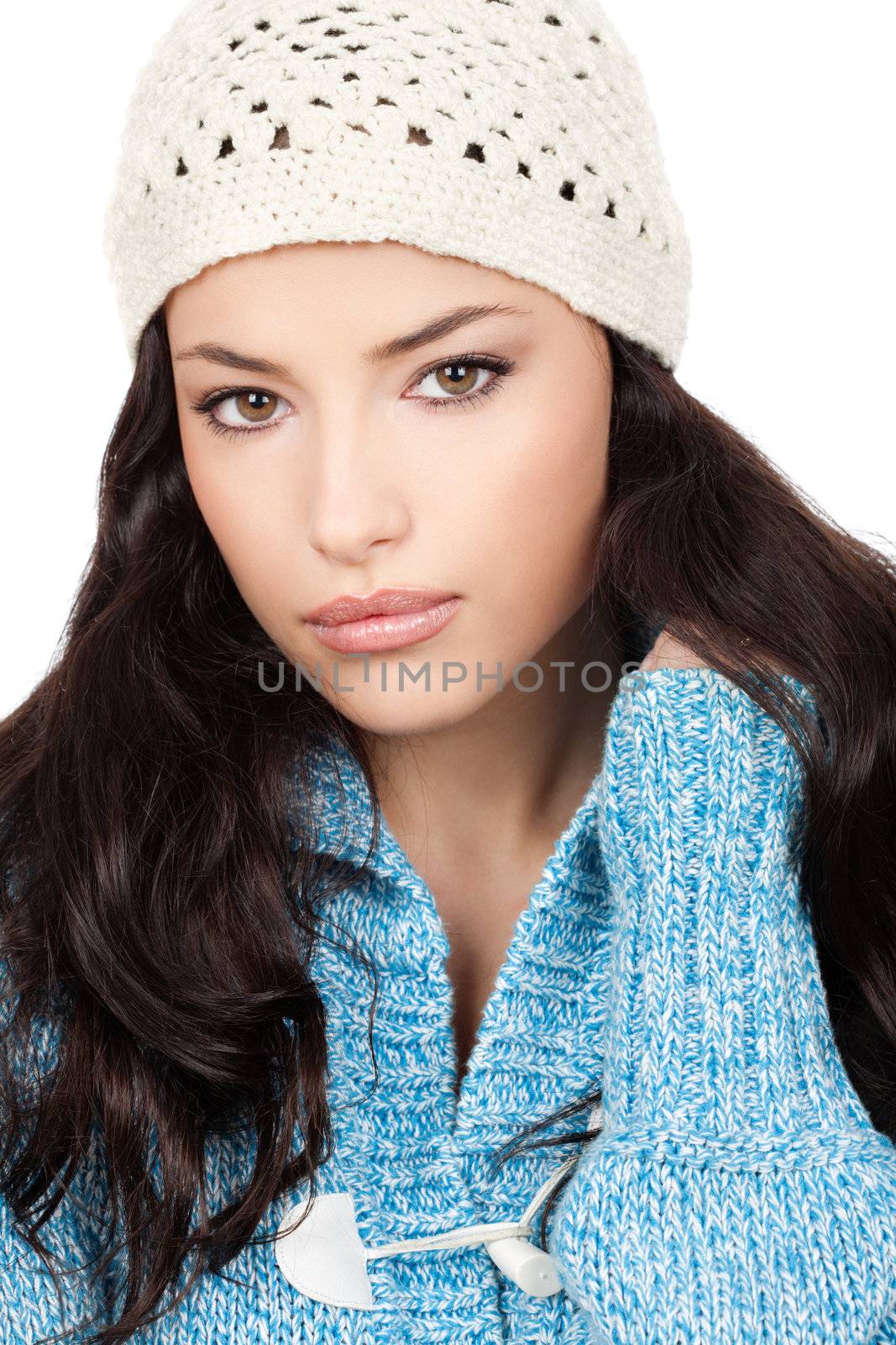 young black hair woman with white cap and blue wool sweater, isolated on white