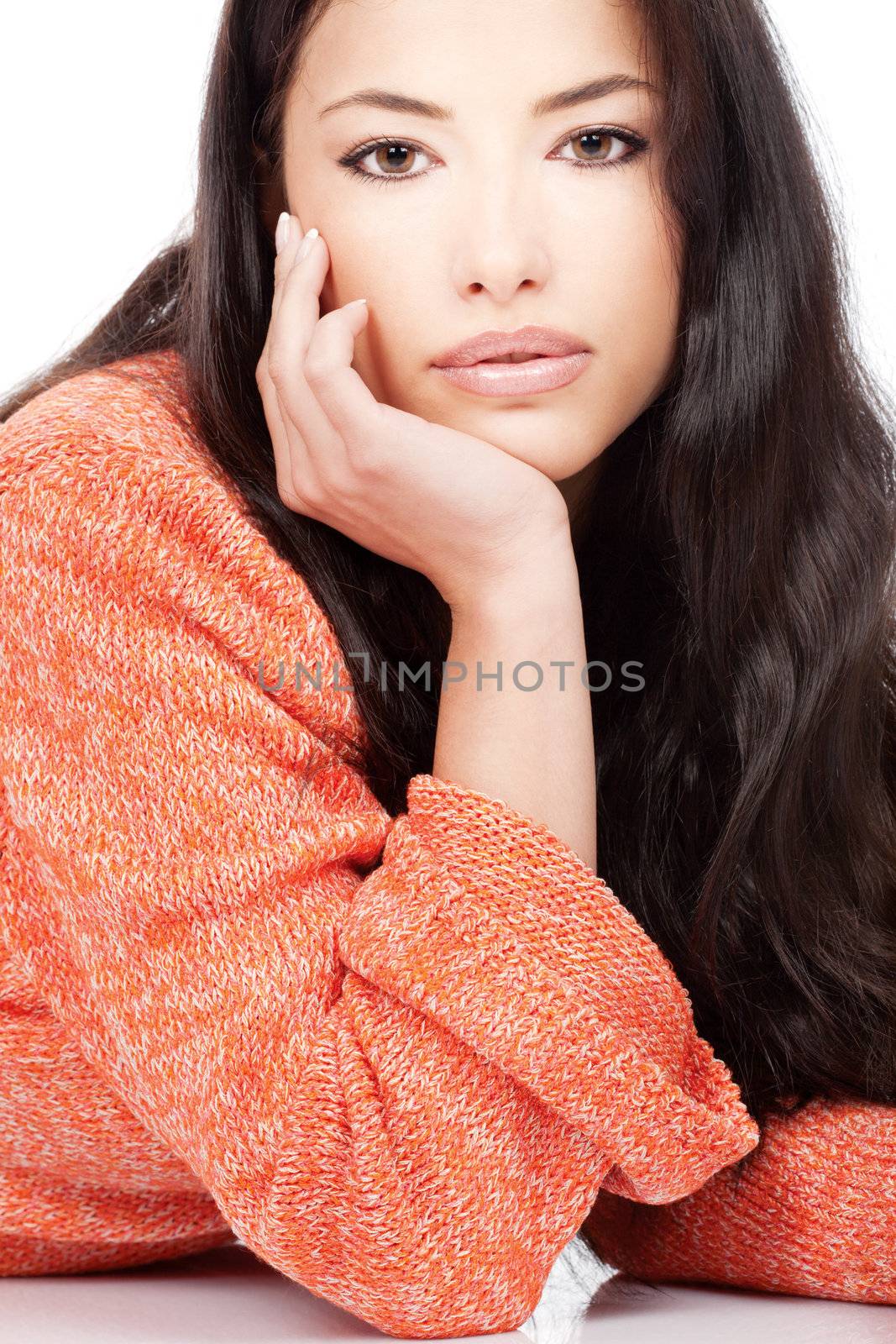 portrait of a young girl in a red orange wool sweater, isolated on white background