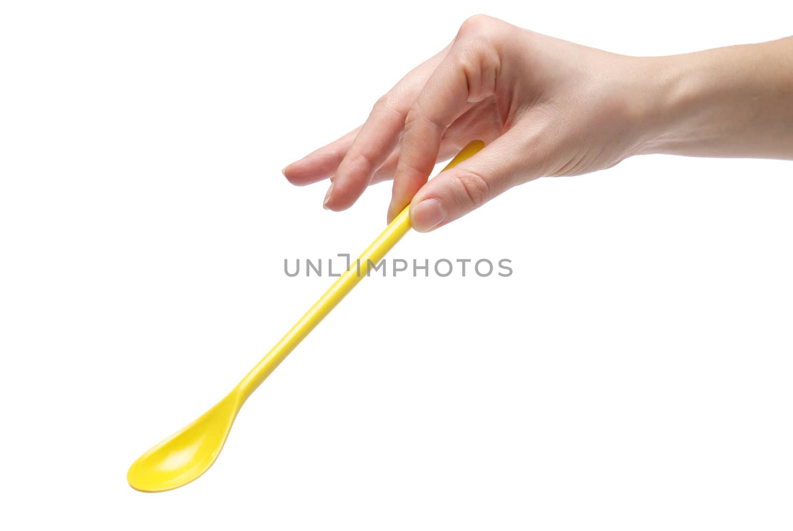 Hand holding an empty teaspoon, isolated on white background
